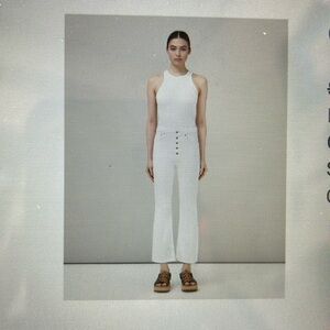 NWT - Rag & Bone white jeans flare bottom. High waisted with exposed buttons.